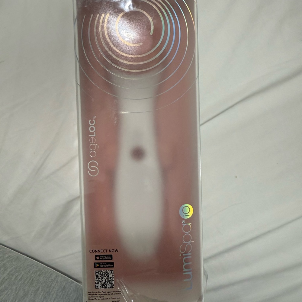 Skin White and Silver Electronic Device